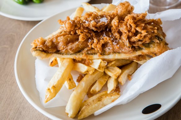 Josh Niland's batter-fried fish, chips and condiments.