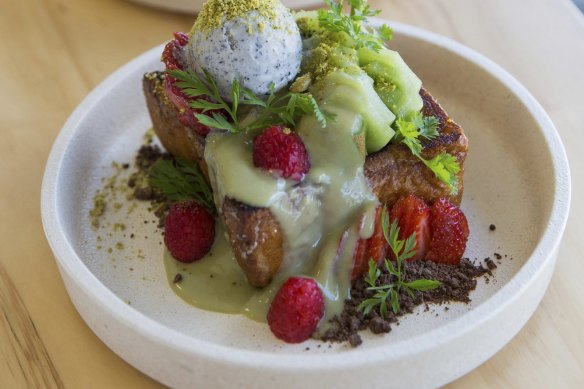 Shibuya-style honey toast with matcha custard, black sesame ice-cream, fruit and flowers.