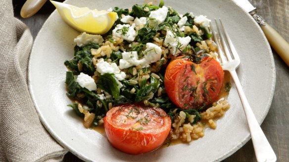 Greek spinach rice with roast tomatoes and feta.