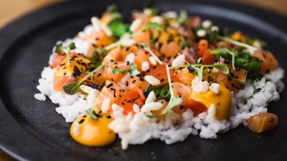 Sushi or taco? Chirashizushi is served with nori sheets to DIY.