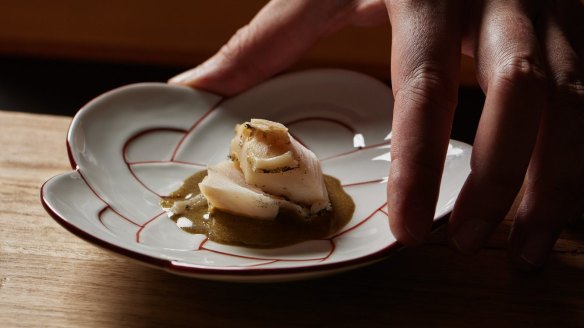 Steamed abalone is one of up to 21 courses served by the chefs.