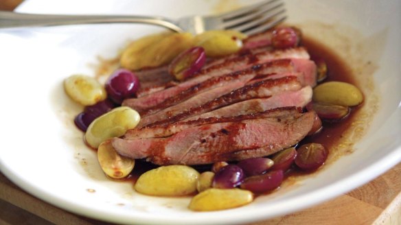 Grilled duck breast with grapes.