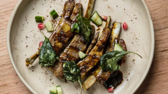 Kashmiri lamb ribs with cucumber and saltbush.