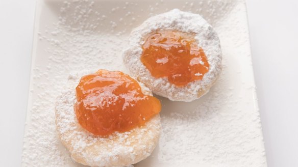 Dessert is a clear choice: fresh hot Hungarian doughnuts, showered in powdered sugar and dolloped with the jam of your choice. This one is with apricot jam.