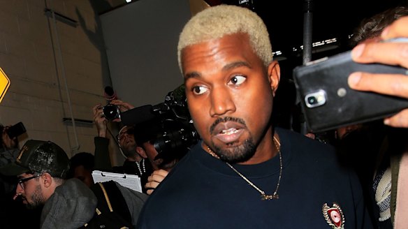 Kanye West (and his new bleached blonde 'do) leaves the Yeezy show fashion during New York Fashion Week.