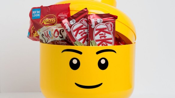 Lego Man head lolly jar.