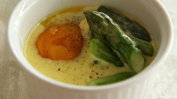Coddled egg with asparagus.