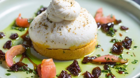 Burrata perched on pumpkin puree.