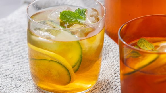 Iced tea with lemon, mint and cucumber.