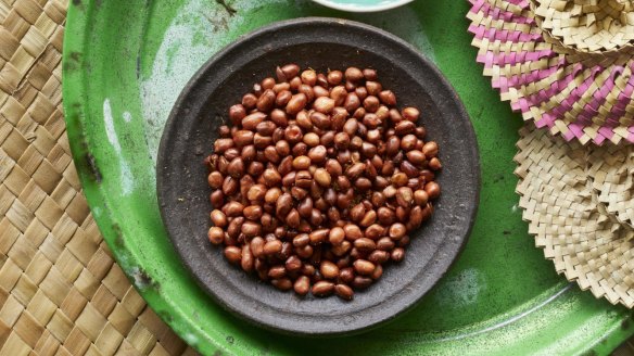 Use fried peanuts as a side, a snack or to make peanut sauce.