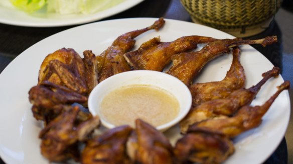 Fried quails and sticky rice $10 at Lao Village in Fairfield.