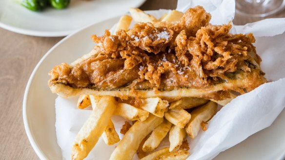 Josh Niland's batter-fried fish, chips and condiments.