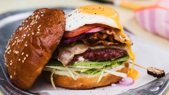 Discover joy in the layers of the Aussie burger with the lot.