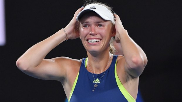 Caroline Wozniacki tears up as she takes in her triumph.