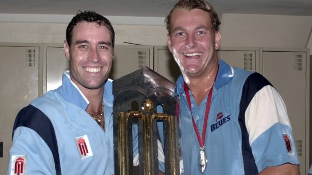 Local lights: Michael Bevan and Shane Lee celebrate with the Mercantile Mutual Trophy back in 2001.