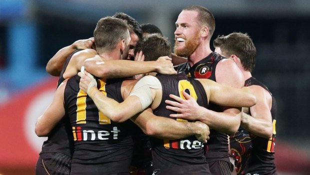 Jarryd Roughead celebrates with his teammates after his match-winning goal.