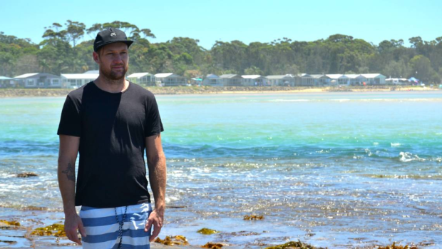 Damien Martin was one of two people who rescued the group of swimmers.