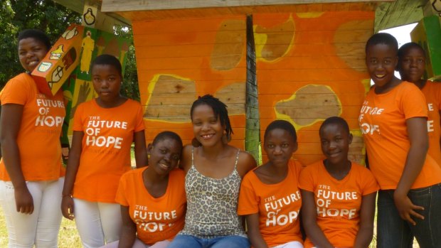 Chido Govera with girls from the Future of Hope Foundation.