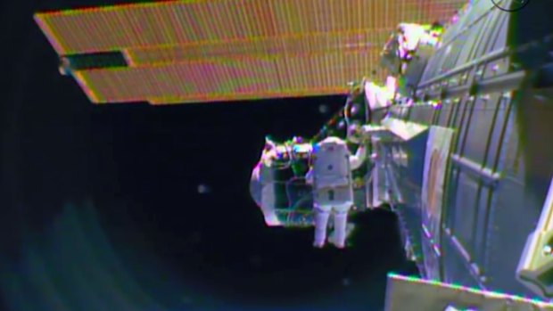 Barry "Butch" Wilmore begins the spacewalk for the arrival in July of the international docking port for the Boeing and Space-X commercial crew vehicles.