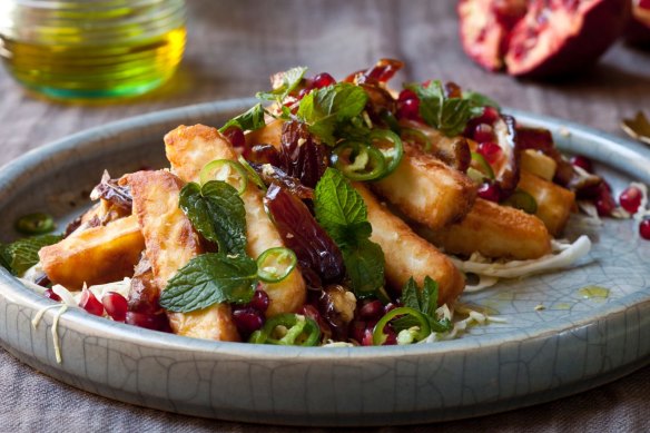 Fried haloumi with white cabbage, date and pomegranate salad.