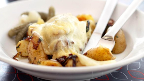 Stephanie Alexander's raclette cheese melted on potatoes.