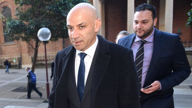 Eddie Obeid's son Moses (left) arrives at the Supreme Court on Tuesday.