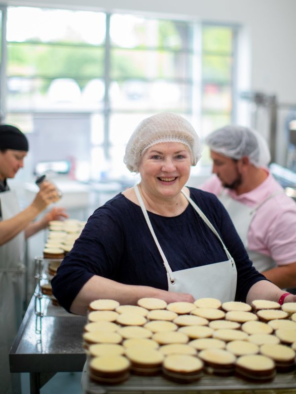 Alison Lansley, secretary of the Australian Specialist Cheesemakers, gets hands on. 