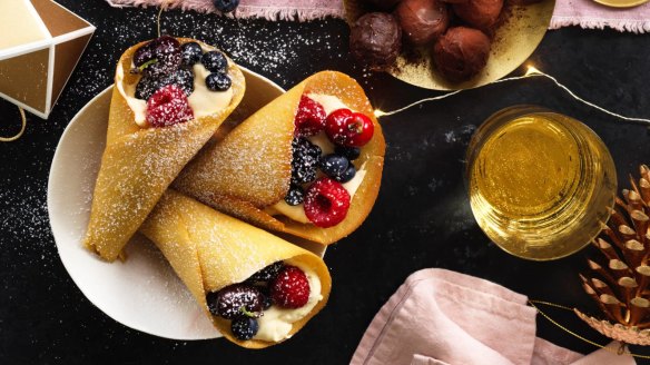 Christmas tuilles filled with Vin Santo cream, berries and cherries.