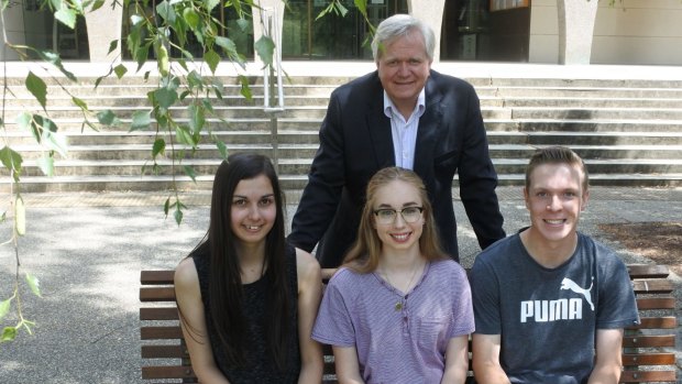 ANU Vice-Chancellor Professor Brian Schmidt with ACT students Katrina Gibbins, Georgia Larsen and Joshua Guest who have received early 2017 places.
