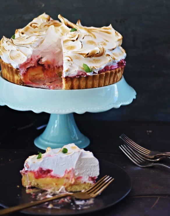 Lemon and raspberry-cardamom pie topped with wispy clouds of torched Italian meringue.