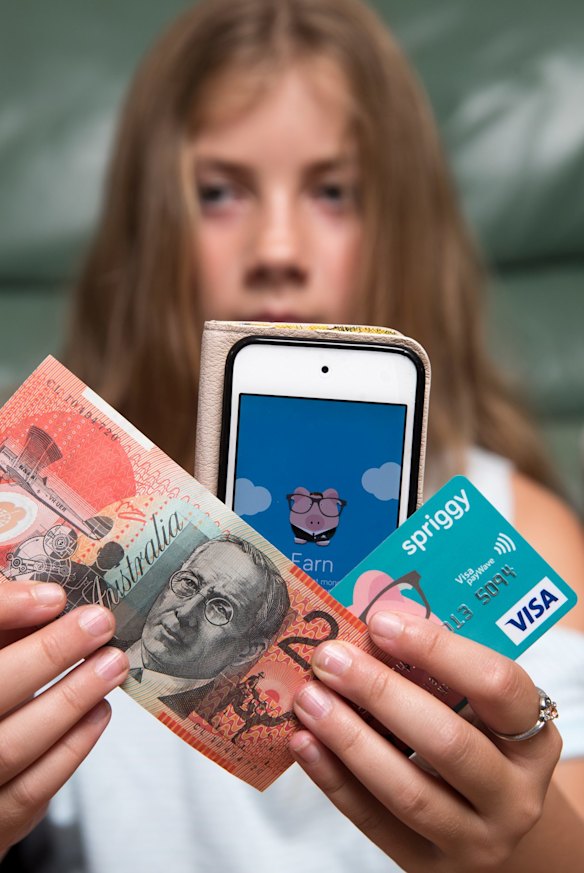 Danika Klinkenberg gets her pocket money paid straight into a credit card linked with an app. 