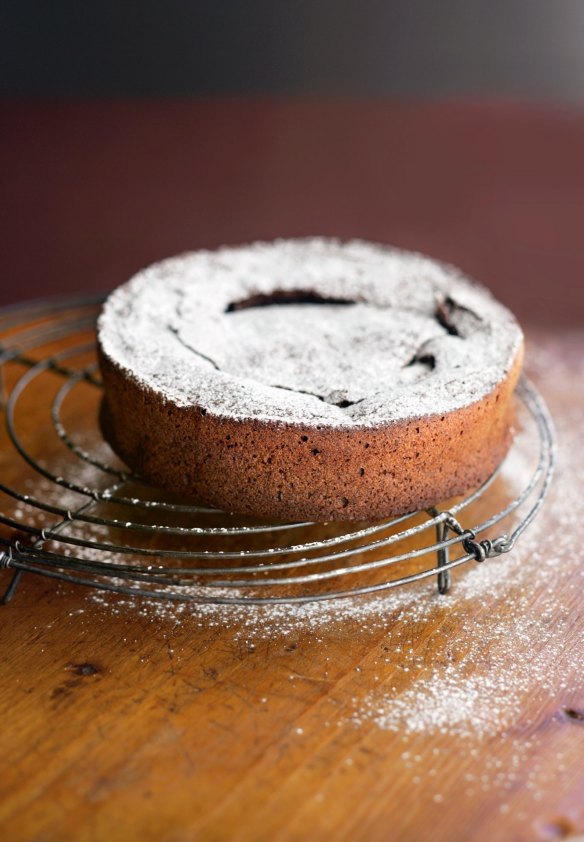Letting a cake cool in the tin reduces the risk of cracking when you turn it on to a cake rack.