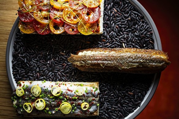 Pan tomate (left) and anchovy churro.