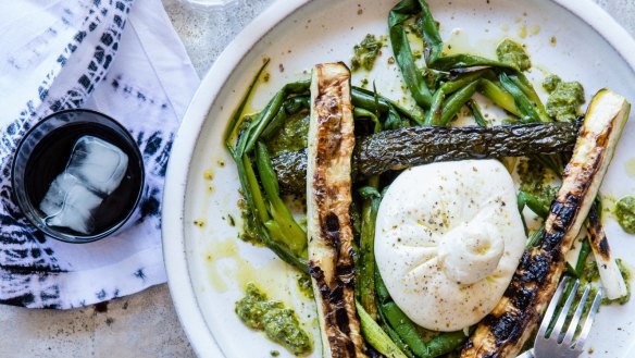 Burrata cheese with charred zucchini and spring onions.
