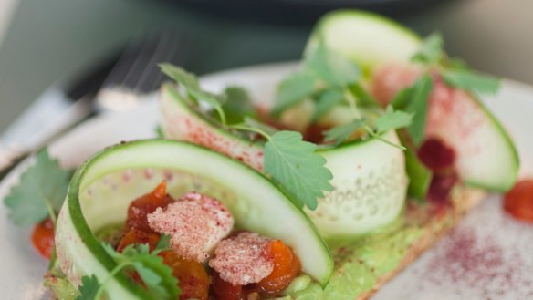 Bruschetta with smashed avocado, sourdough, tomatoes and feta. 