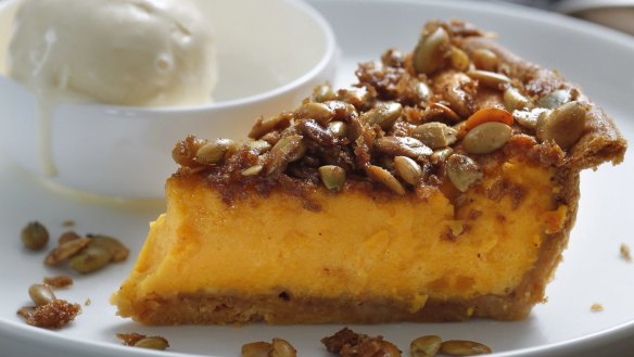 Pumpkin pie with vanilla ice-cream.