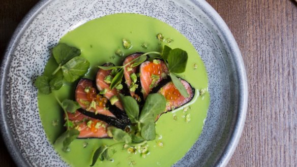 Quite the looker: Smoking salmon sashimi, wasabi pea and nori.