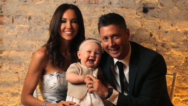 Book business: Former Australian captain Michael Clarke with wife Kyly and daughter Kelsey Lee at his book launch.