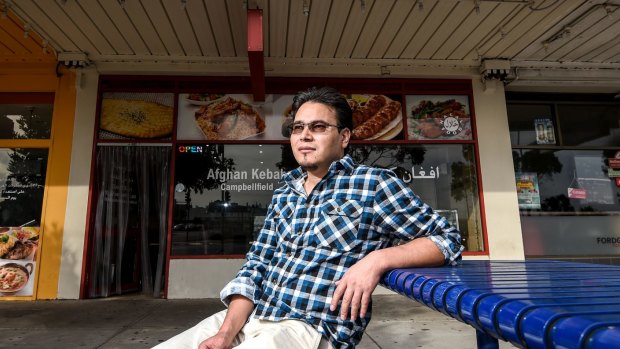 Refugee Esmattulah Hakimi's newly opened diner is across the road from the Ford factory, which closes down next year.