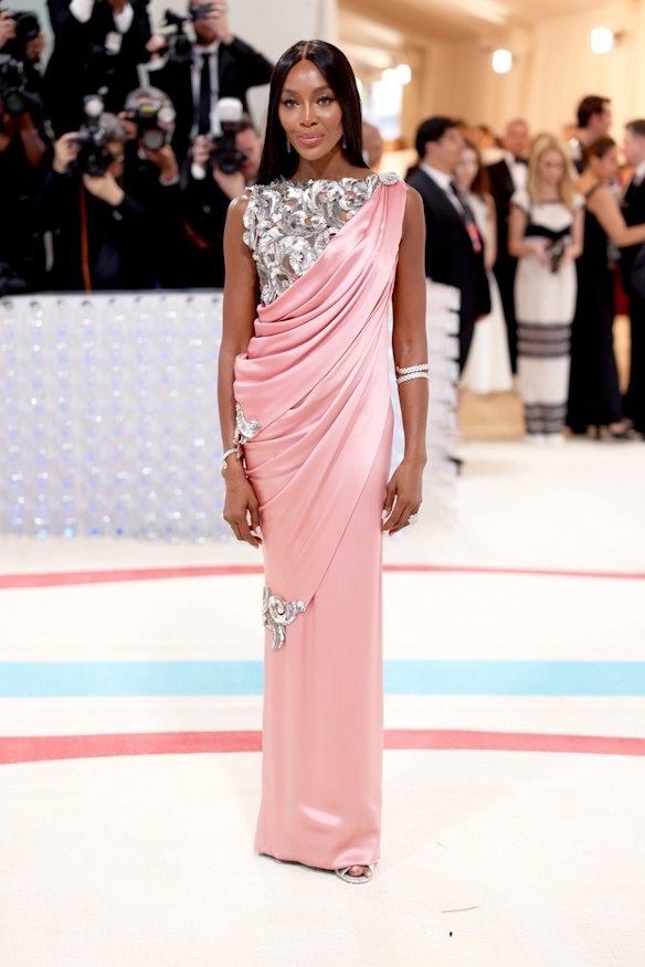 Naomi Campbell wears Chanel SS10 Couture.