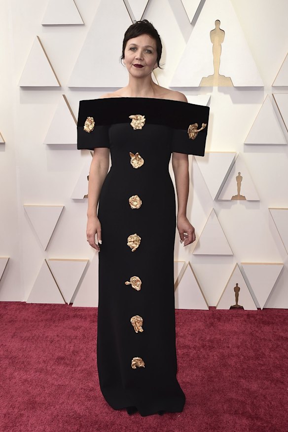 Maggie Gyllenhaal wears custom Schiaparelli.