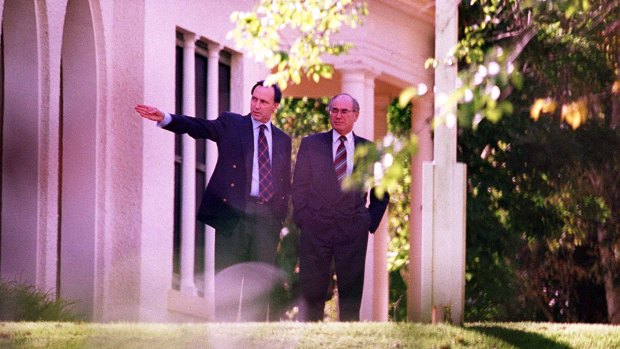 Paul Keating, shows the Lodge garden to its new tenant, John Howard, in March 1996.

