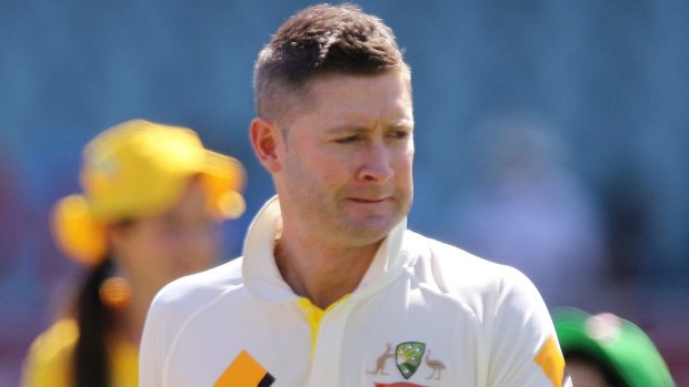 Australian cricket captain Michael Clarke wears a black armband during a ceremony to pay tribute to Phillip Hughes.