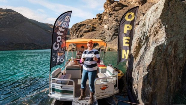 Jolanda Foale serving coffee from a floating café.