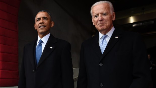 Barack Obama and Joe Biden arrive on Capitol Hill for Donald Trump's inauguration.