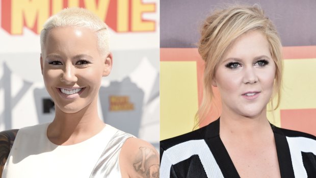 Amber Rose and Amy Schumer shared a kiss at the MTV Movie Awards.