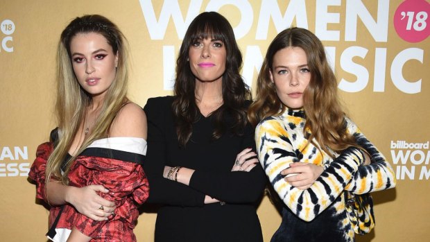 From left, Fletcher, Michelle Jubelirer and Maggie Rogers attend the Billboard Women in Music event in New York in December.
