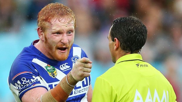 Confrontation: James Graham confronts referee Gerard Sutton after awarding the Rabbitohs the game-deciding penalty.