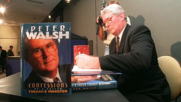 Peter Walsh signs copies of his book at the National Press Club in 1995.