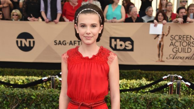 Millie Bobby Brown arrives at the 23rd annual Screen Actors Guild Awards.